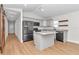 Kitchen featuring granite countertops, recessed lighting, and gray cabinets at 3496 Sw 149Th Ct, Ocala, FL 34481