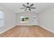 Living room featuring wood floors, recessed lighting and a ceiling fan at 3496 Sw 149Th Ct, Ocala, FL 34481