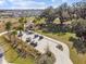 Aerial view of the golf cart parking area in a community surrounded by mature oak trees at 4522 Shockoe Cir, The Villages, FL 32163