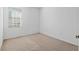 Empty bedroom with neutral wall and carpet at 7947 Sw 80Th Place Rd, Ocala, FL 34476