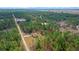 Wide angle aerial view of a house and surrounding neighborhood at 8436 Sw 136Th Ter, Dunnellon, FL 34432