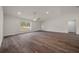 Spacious living room featuring hardwood floors and a ceiling fan at 8436 Sw 136Th Ter, Dunnellon, FL 34432