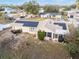 Backyard aerial view of the house featuring solar panels at 8968 Sw 116Th Place Rd, Ocala, FL 34481
