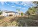 Fenced backyard with solar panels on roof, providing a blend of privacy and eco-friendly features at 8968 Sw 116Th Place Rd, Ocala, FL 34481
