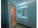 Bathroom with light teal walls, a shower, and vanity at 8968 Sw 116Th Place Rd, Ocala, FL 34481