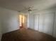 Bedroom with neutral carpet and large closets at 8968 Sw 116Th Place Rd, Ocala, FL 34481