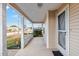 View of the home's front porch and surrounding area at 8968 Sw 116Th Place Rd, Ocala, FL 34481