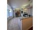 Spacious kitchen featuring tile flooring, stainless steel appliances, and plenty of countertop space at 8968 Sw 116Th Place Rd, Ocala, FL 34481