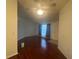 Bright living room with hardwood floors and window at 8968 Sw 116Th Place Rd, Ocala, FL 34481