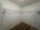 Large walk-in closet with wire shelving for ample storage at 8968 Sw 116Th Place Rd, Ocala, FL 34481