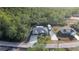 Property showing house, large backyard, and neighboring houses at 21 Fisher Trail Pass, Ocklawaha, FL 32179