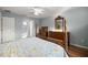 Bedroom with wood furniture and ceiling fan at 21 Fisher Trail Pass, Ocklawaha, FL 32179