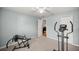 Bedroom with elliptical and rowing machine at 21 Fisher Trail Pass, Ocklawaha, FL 32179