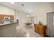 Kitchen dining area with wood buffet and table at 21 Fisher Trail Pass, Ocklawaha, FL 32179