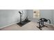 Home gym with elliptical and rowing machine at 21 Fisher Trail Pass, Ocklawaha, FL 32179