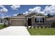Charming single-story home featuring a two-car garage and beautiful stone accents at 9291 Sw 60Th Court Rd, Ocala, FL 34476
