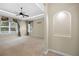 The bedroom has neutral paint, carpet flooring, and plantation shutters at 3907 Se 10Th Ave, Ocala, FL 34480