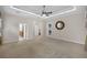 Spacious bedroom with carpet flooring, tray ceilings, and recessed lighting at 3907 Se 10Th Ave, Ocala, FL 34480