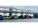 View of the condo parking lot showcasing assigned covered parking for residents and guests at 548 Fairways Dr # B, Ocala, FL 34472