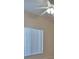 Bedroom with ceiling fan and window with blinds at 5520 Nw 26Th Ln, Ocala, FL 34482