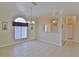 Dining room with arched window and tile flooring at 5520 Nw 26Th Ln, Ocala, FL 34482