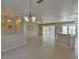 Open concept living and dining area with tile floors at 5520 Nw 26Th Ln, Ocala, FL 34482