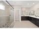 Elegant bathroom with double vanity, large shower, and modern fixtures at 7781 Sw 59Th Ln, Ocala, FL 34474