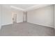 Bright bedroom with carpeted floors and access to bathroom at 7781 Sw 59Th Ln, Ocala, FL 34474