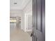 Bright and spacious entryway with tile flooring and view to living room at 7781 Sw 59Th Ln, Ocala, FL 34474