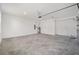 Spacious garage with high ceilings and concrete floor at 7781 Sw 59Th Ln, Ocala, FL 34474