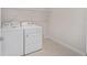 Laundry room with washer, dryer and overhead shelving at 7781 Sw 59Th Ln, Ocala, FL 34474