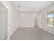 Bright office with grey carpet, window and closet at 7781 Sw 59Th Ln, Ocala, FL 34474