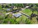 Aerial view of a house with fenced backyard at 14462 Se 28Th Ct, Summerfield, FL 34491