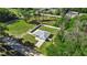 Aerial view of a house with fenced backyard at 14462 Se 28Th Ct, Summerfield, FL 34491