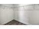 Walk-in closet with wire shelving and dark wood floor at 14462 Se 28Th Ct, Summerfield, FL 34491