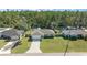 Aerial view of a house with a backyard, swimming pool, and surrounding greenery at 17006 Sw 39Th Cir, Ocala, FL 34473