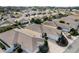 Aerial view of Belmont Villas, showcasing numerous homes with attractive landscaping at 2840 Leicester Ter, The Villages, FL 32162