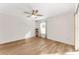 Light and airy bedroom with vinyl flooring and ceiling fan at 2840 Leicester Ter, The Villages, FL 32162