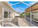 Relaxing screened porch with sliding glass doors at 2840 Leicester Ter, The Villages, FL 32162