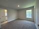 Bedroom featuring carpet floors and a window with natural light at 4445 Sw 90Th Pl, Ocala, FL 34476