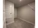 Walk-in closet with neutral walls, tile flooring, and wire shelving offering practical storage space at 4445 Sw 90Th Pl, Ocala, FL 34476