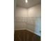 Walk-in closet with carpeted flooring and shelving to keep your clothes and accessories organized at 4477 Sw 90Th Pl, Ocala, FL 34476