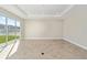 Bright living room with tile floors and sliding glass doors at 7772 Sw 56Th Pl, Ocala, FL 34474