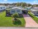 Bird's-eye view of a manufactured home with a spacious yard at 816 Hibiscus Dr, The Villages, FL 32159