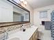 Bathroom boasts double sinks and decorative backsplash at 8955 Sw 104Th Pl, Ocala, FL 34481