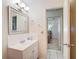 Clean bathroom with vanity and bedroom access at 8955 Sw 104Th Pl, Ocala, FL 34481