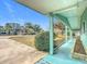 Front porch with view of landscaped yard at 8955 Sw 104Th Pl, Ocala, FL 34481