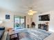 Living room with a view of the screened patio at 8955 Sw 104Th Pl, Ocala, FL 34481