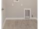 Laundry room with tile floor and built-in cabinets at 10282 Sw 99Th Ln, Ocala, FL 34481