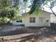 Exterior view of home featuring partial backyard at 21111 Se Honeysuckle St, Dunnellon, FL 34431